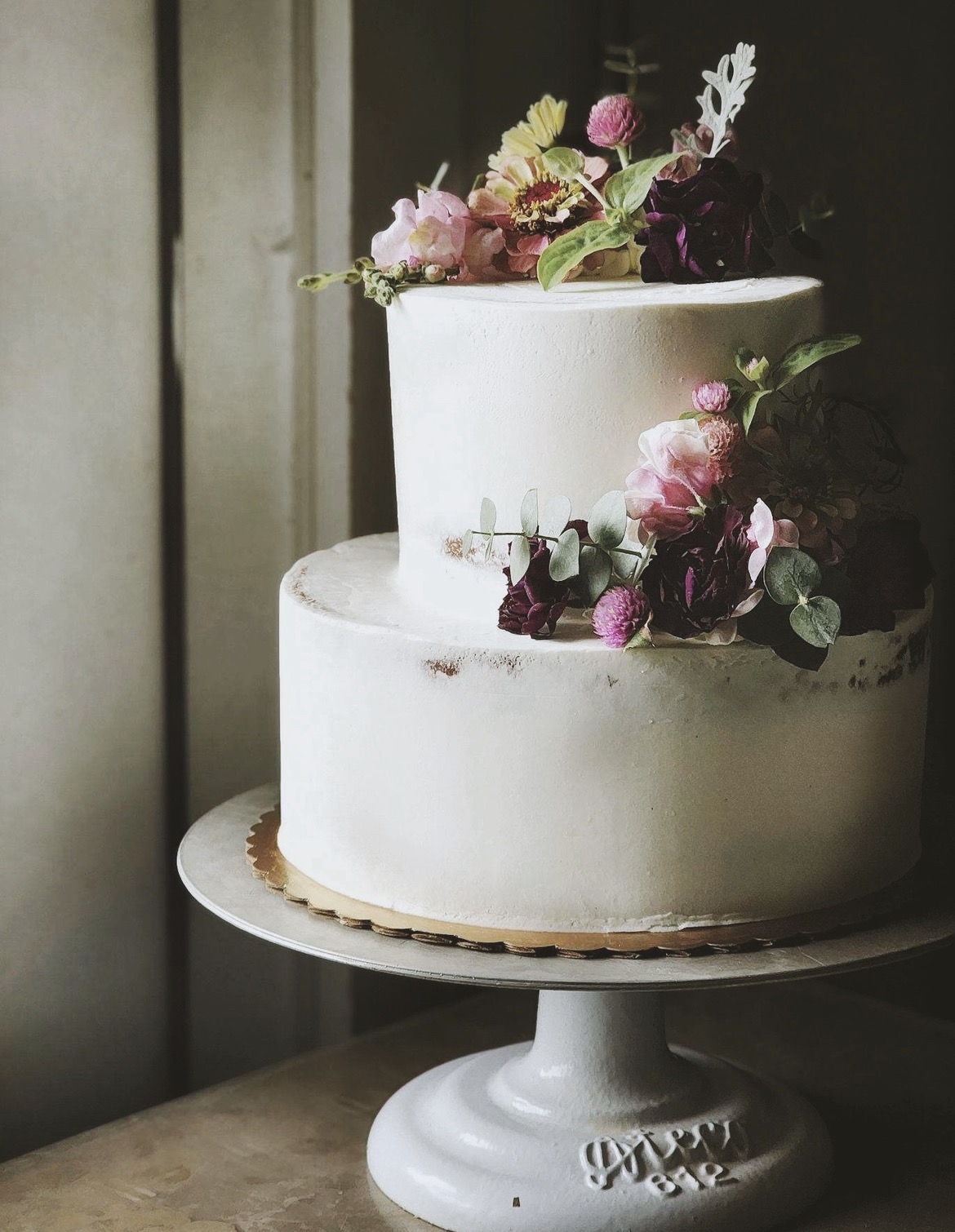 Two-tier floral wedding cake